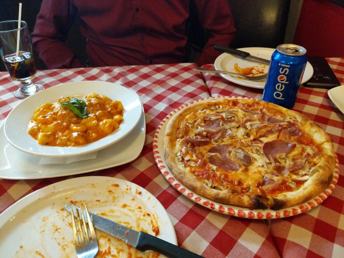 Gnocchi Rose and Gilchrist Pizza and a Plate to Be Refilled
