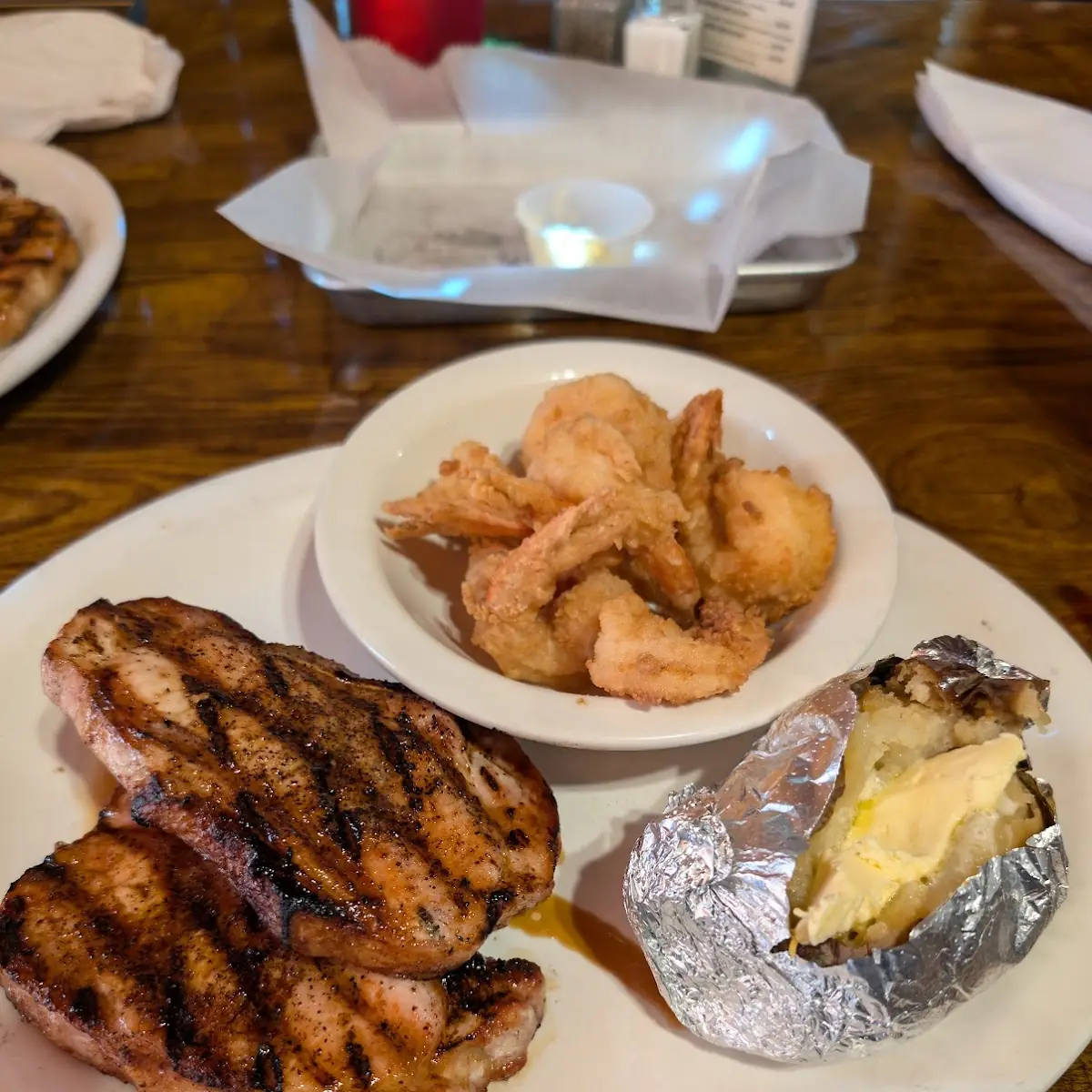 Pork Chops Shrimp and Baked Potato