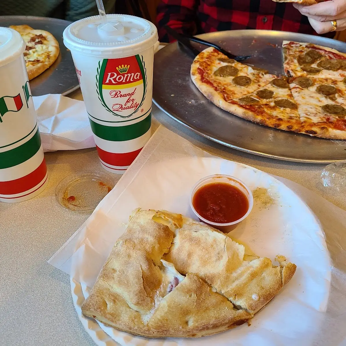 Calzone and Sausage Pizza