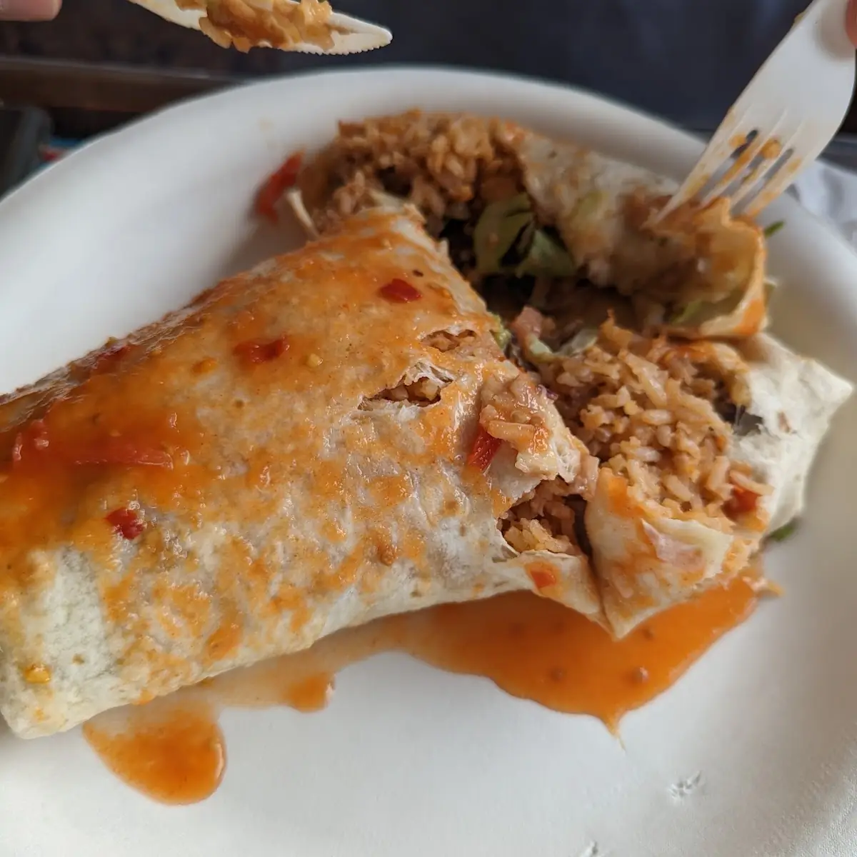 Carne Asada Kitchen Sink Burrito with Hot Sauce