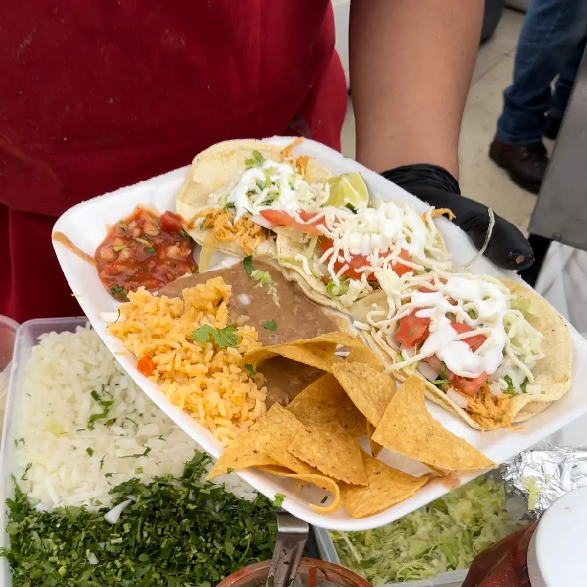 Chicken Tacos with Beans Rice Chips and Salsa