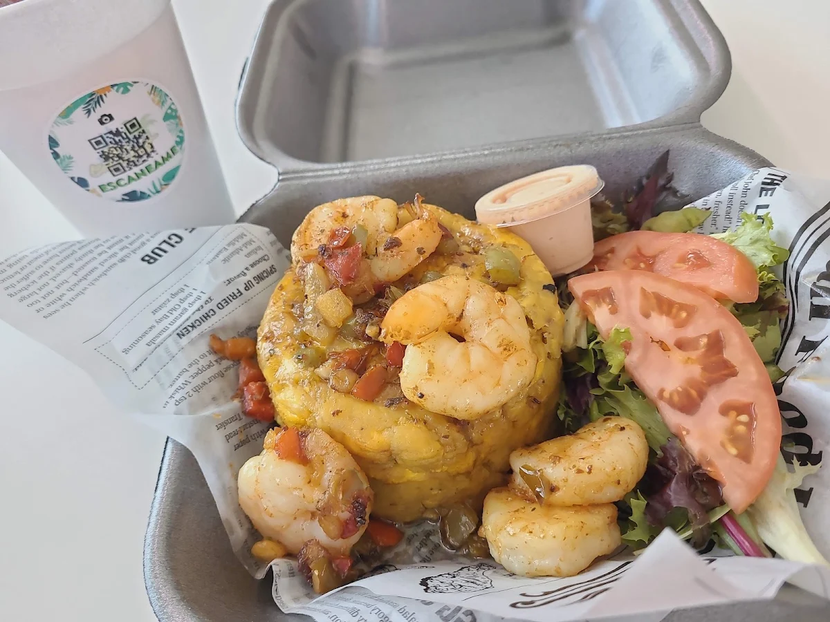 Mofongo Relleno de Pulpo En Salsa Criolla