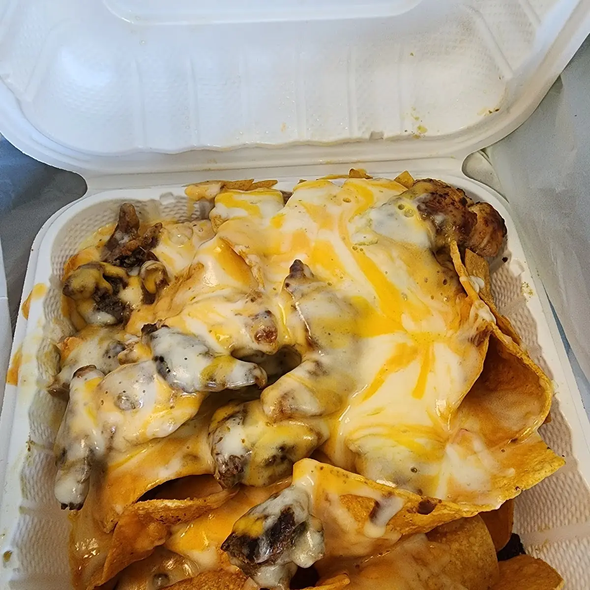 Beef and Chicken Nacho Supreme