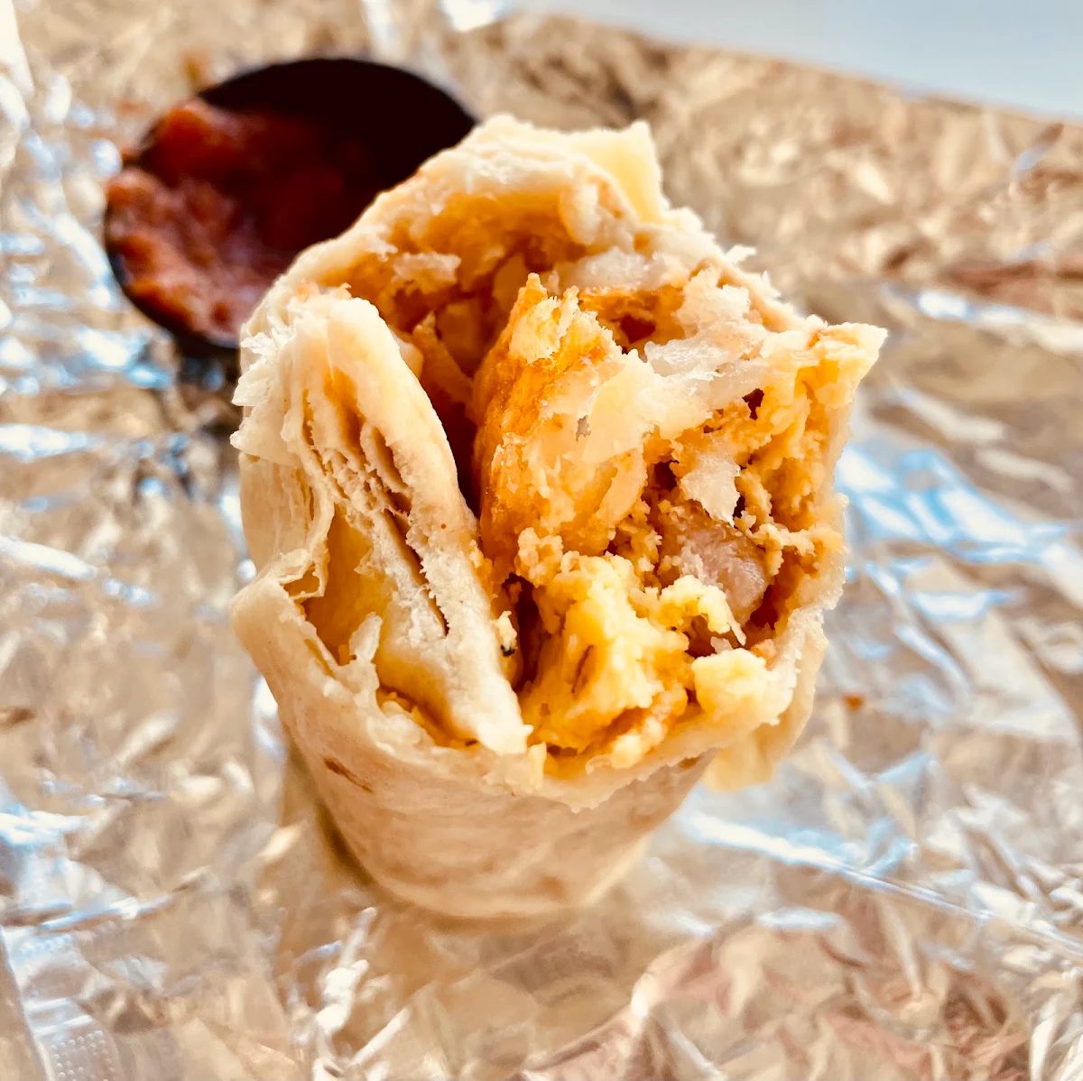 Bacon Potato Egg and Cheese Breakfast Burrito