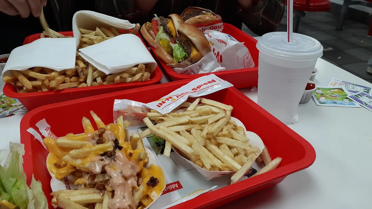 Animal Style Fries Left Regular Fries Right