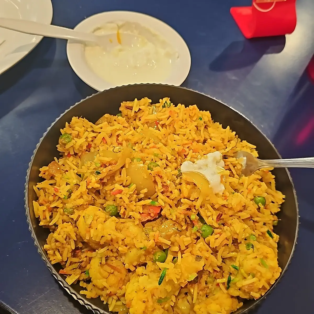 Vegtable Biryani with Yogurt Sauce