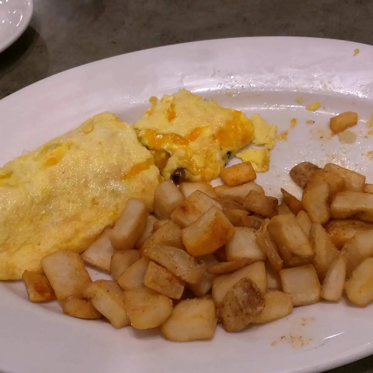 Bacon and Cheese Omelet and Hash Browns