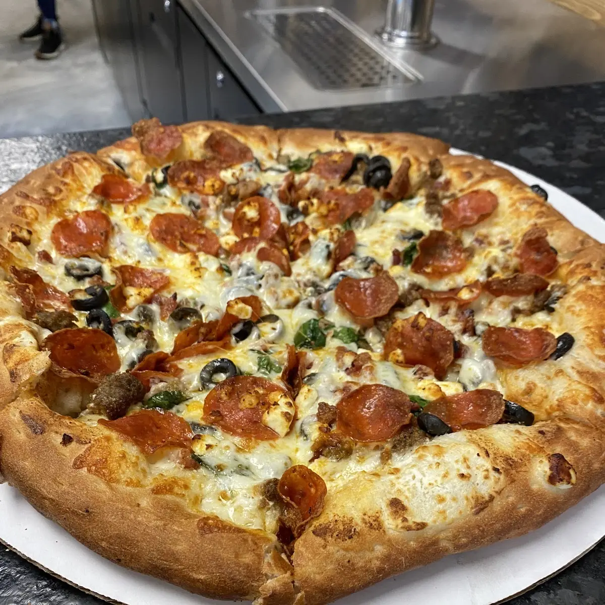 White Three Meat Pizza Add Olives