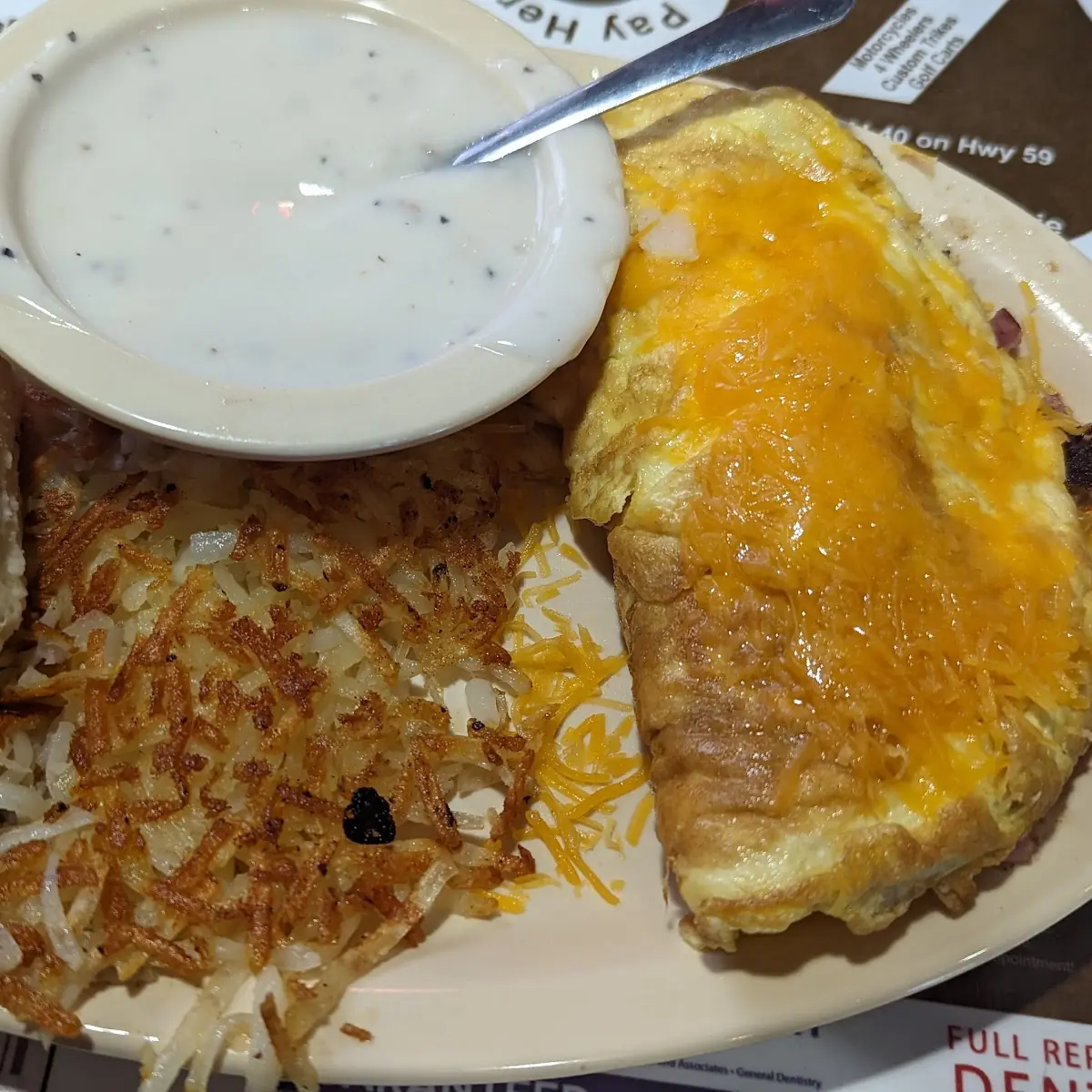 Meat Lovers Omelette with Hash Browns