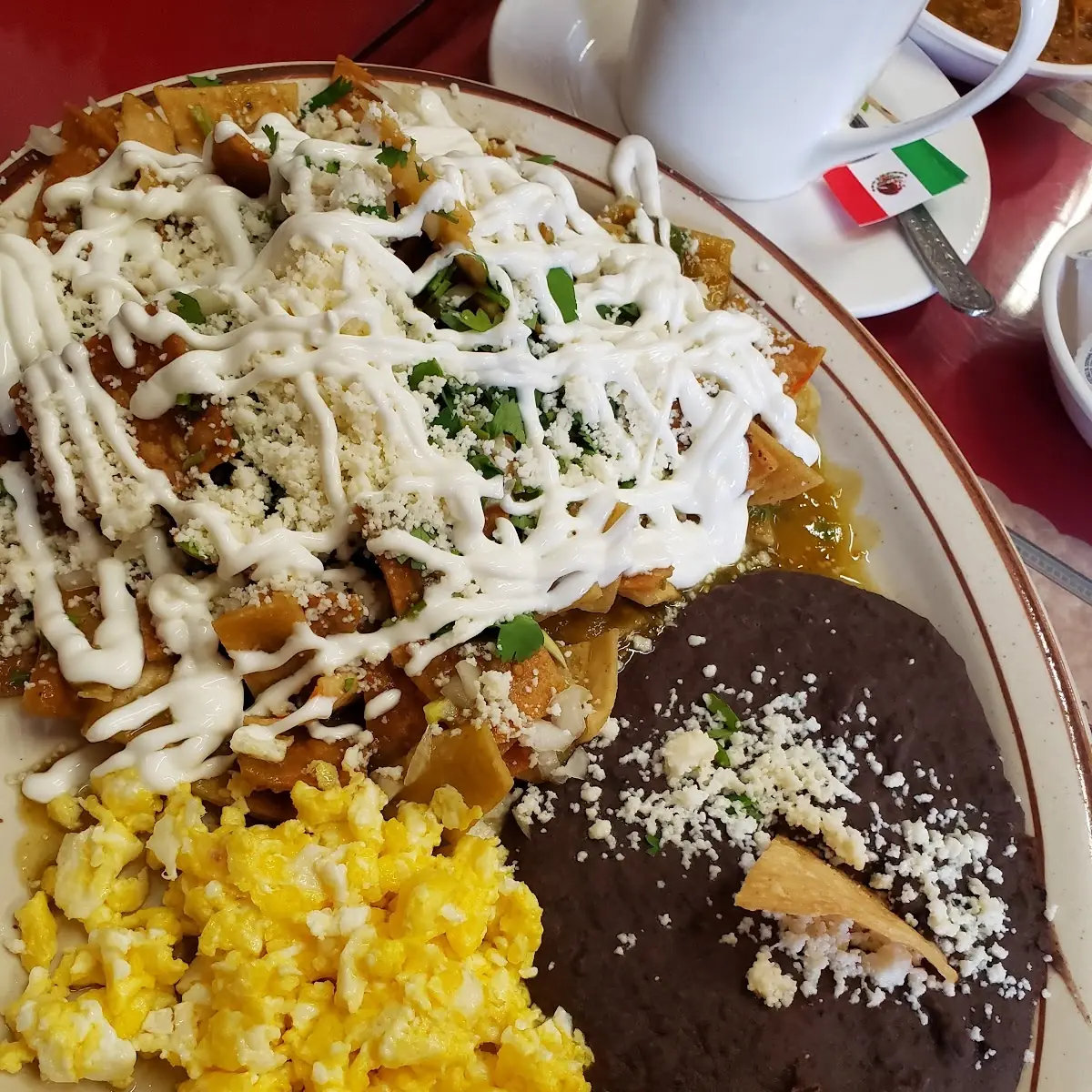 Green Chilaquiles Scrambled Eggs and Black Refried Beans