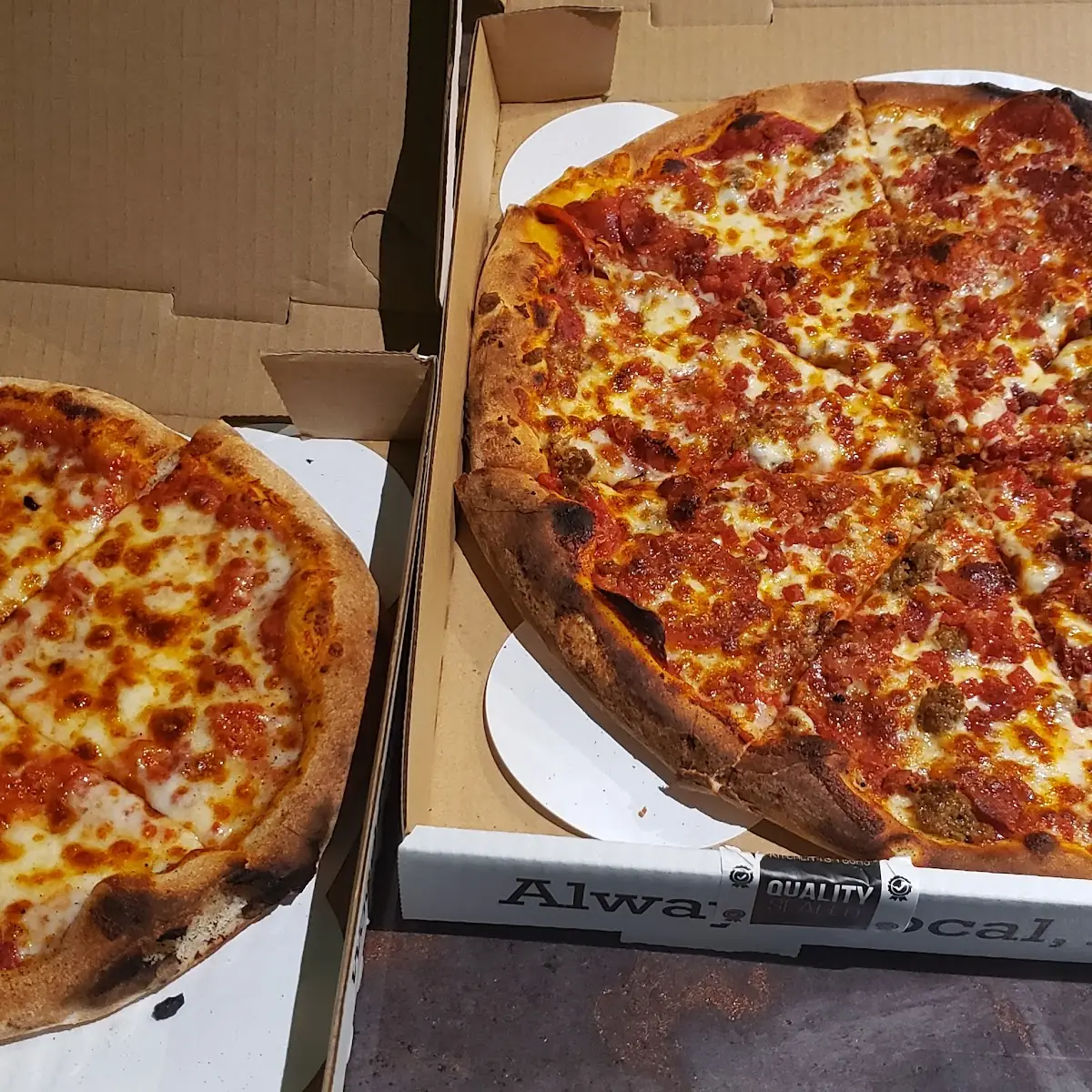 A Meat Pizza & Cheese Pizza