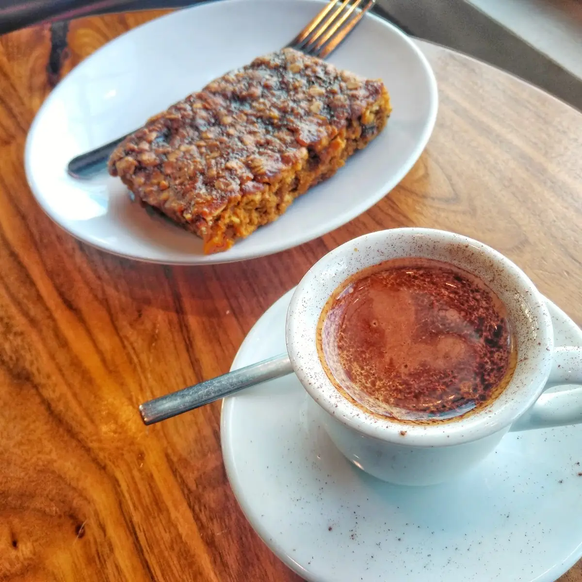 Espresso Doppio with Chocolate Sprinkle and Granola Bar