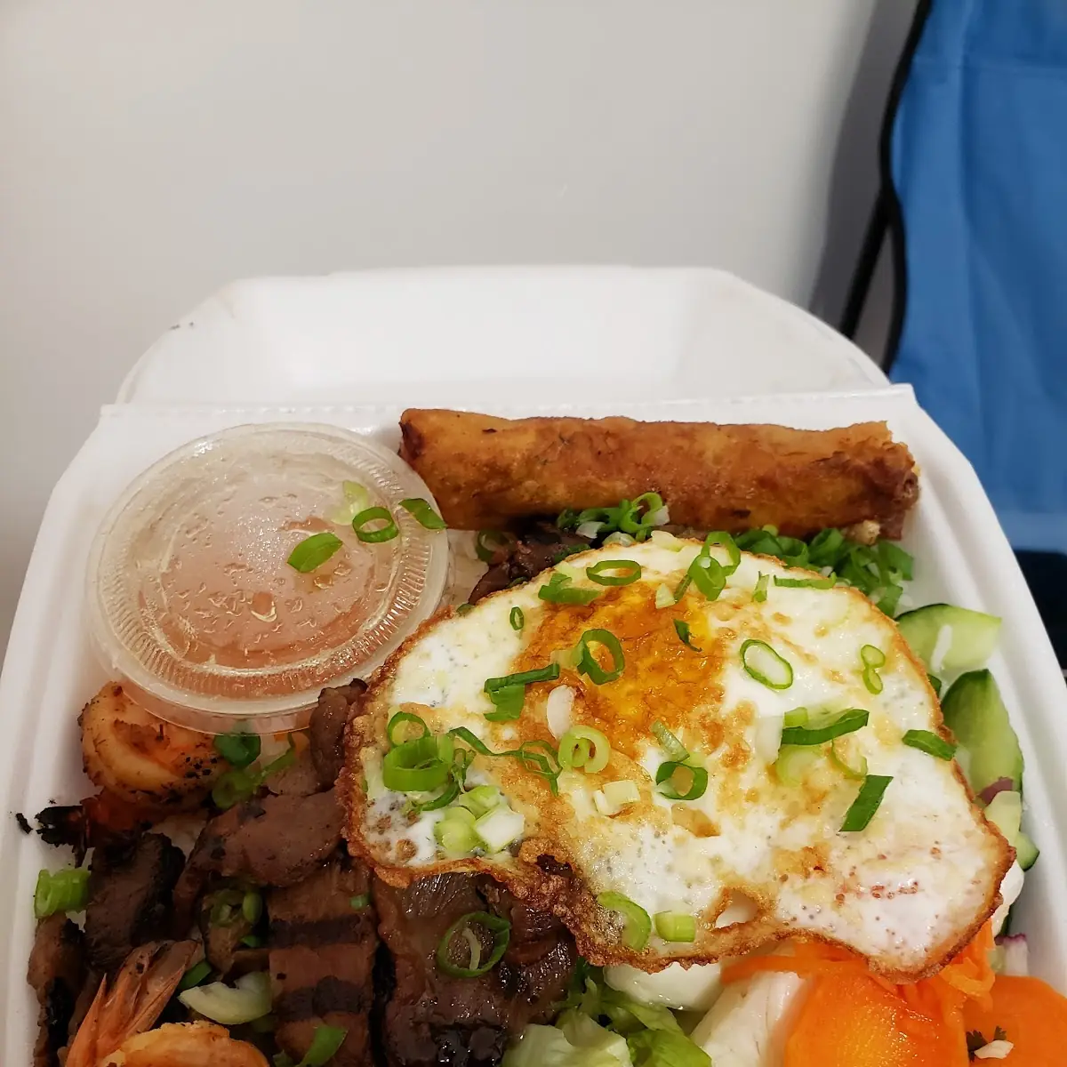 R1 D'Lite Combo Com DAC Biet Crispy Egg Roll Fried Egg Grilled Pork Chop and Shrimp over Rice