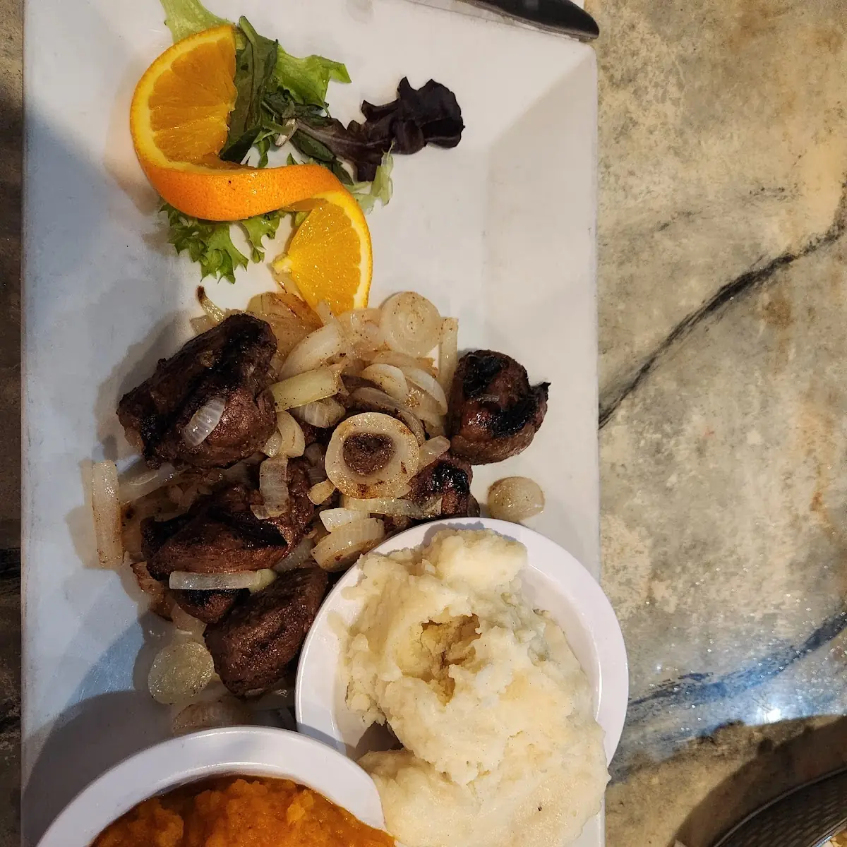 Steaktips w Onions Mashed Potatoes and Squash