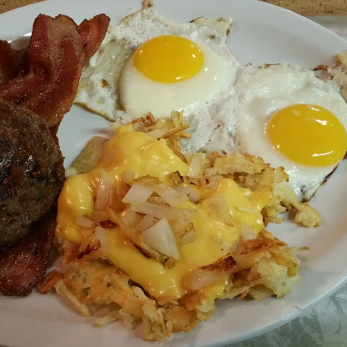 Pancakes and Eggs over Easy with Bacon & Hashed Browns