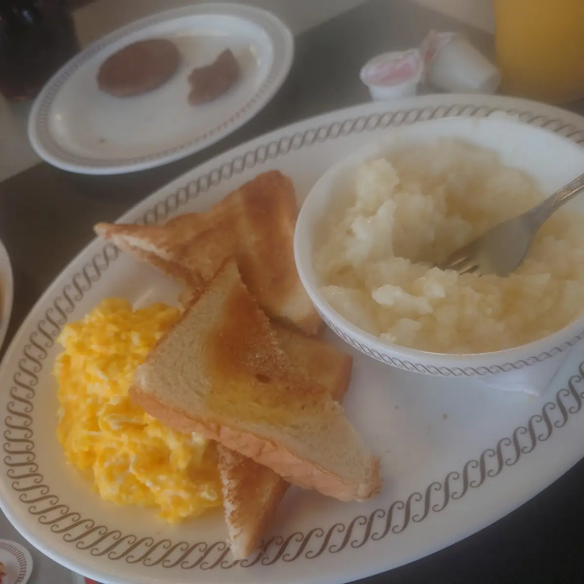 Scrambled Eggs with Cheese Grits and Toast