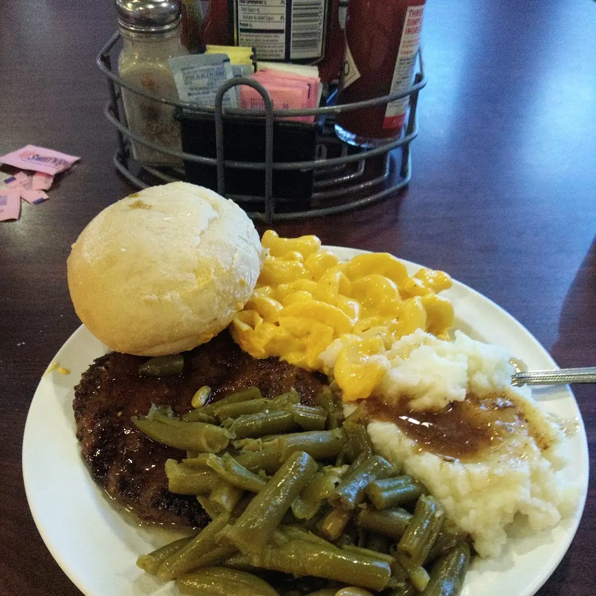 Hamburger Steak with Green Beans and Mashed Potatoes and Gravy with Roll