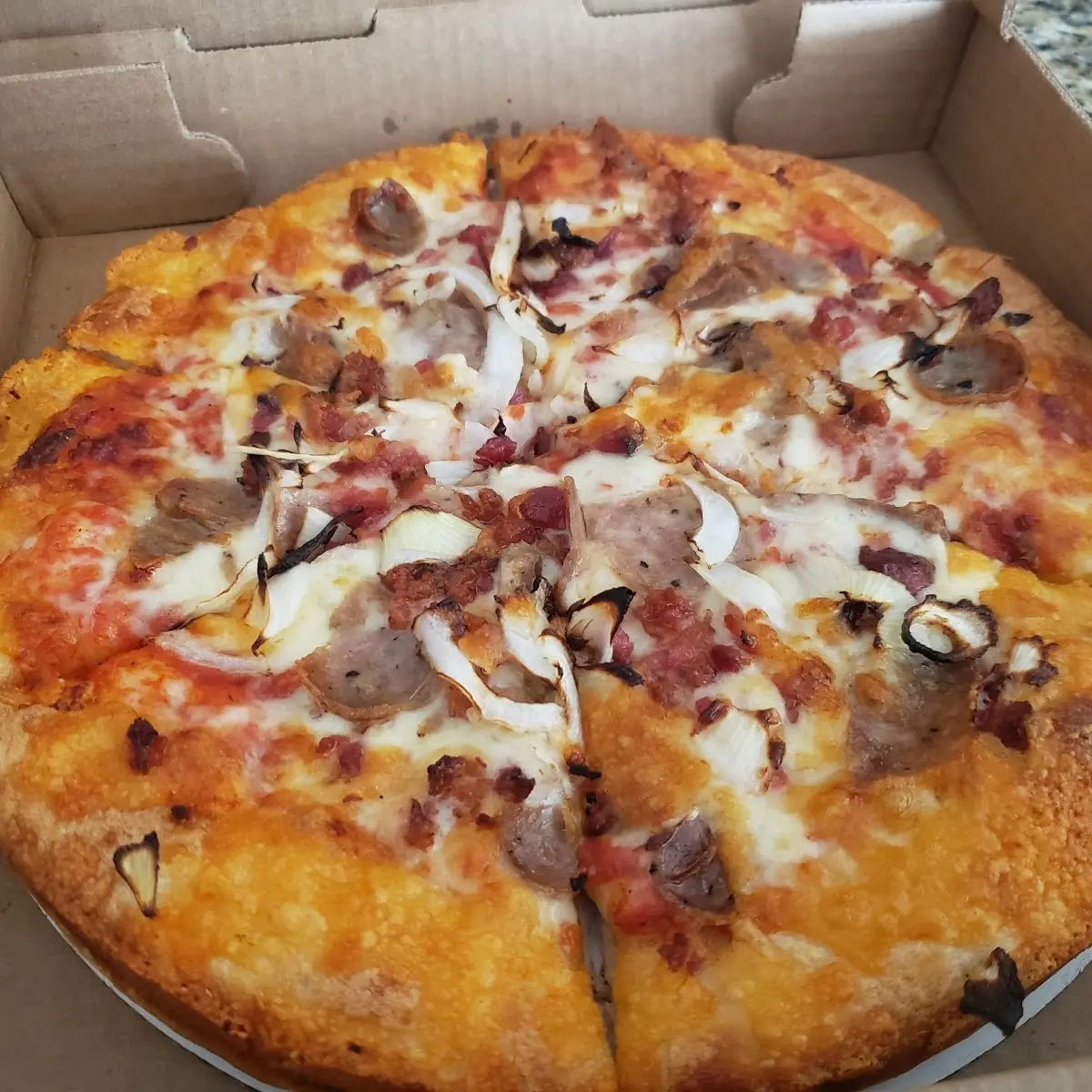 Pizza with Bacon Sausage and Onions
