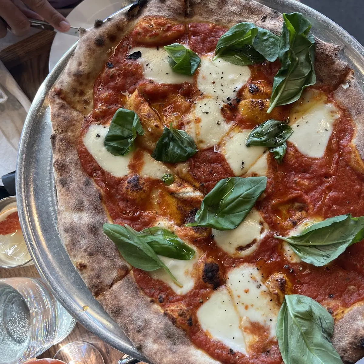 Neapolitan Pizza with Fresh Basil Leaves