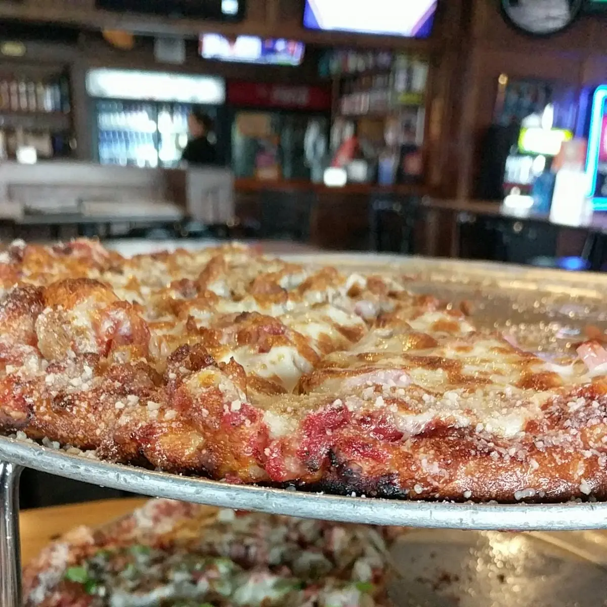 Vito's Supreme and Meat Lovers Pizza