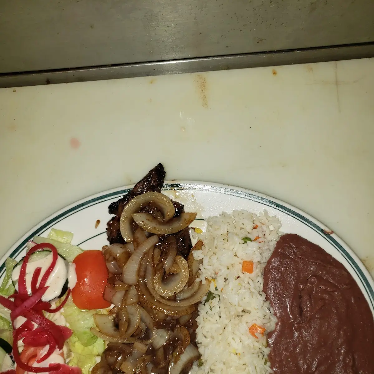 Bistec Encebollado