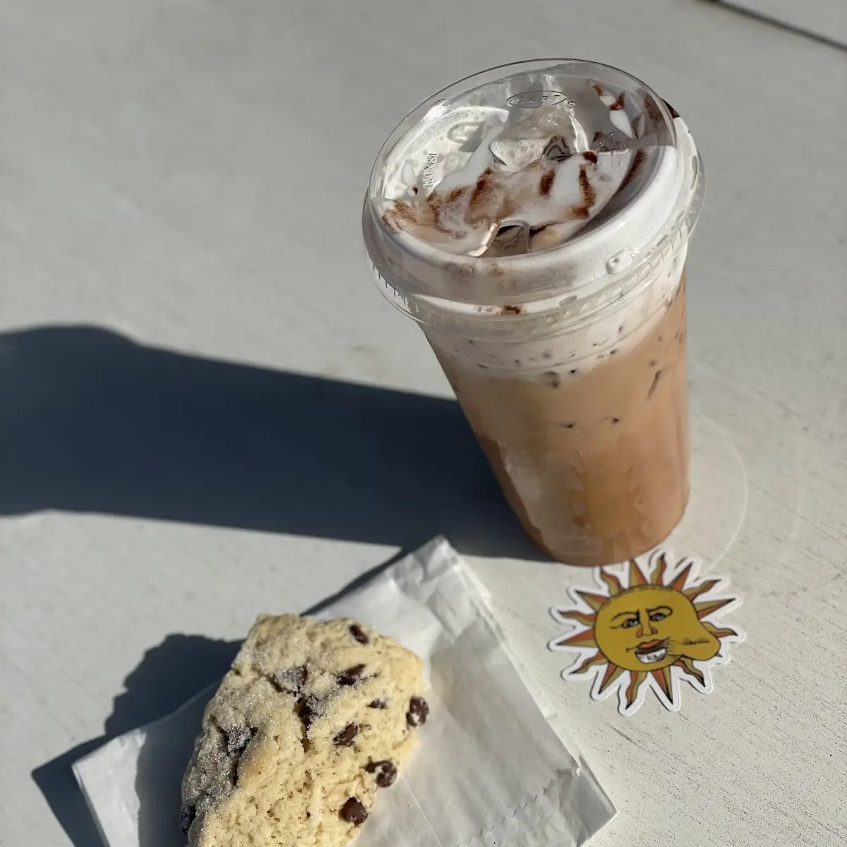 Chocolate Chip Scone & Medium Iced Raspberry Cookie with Cold Foam & Chocolate Drizzle