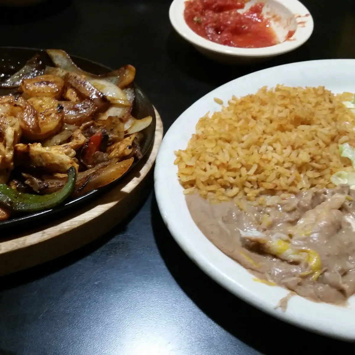 Shrimp Chicken and Steak Fajitas
