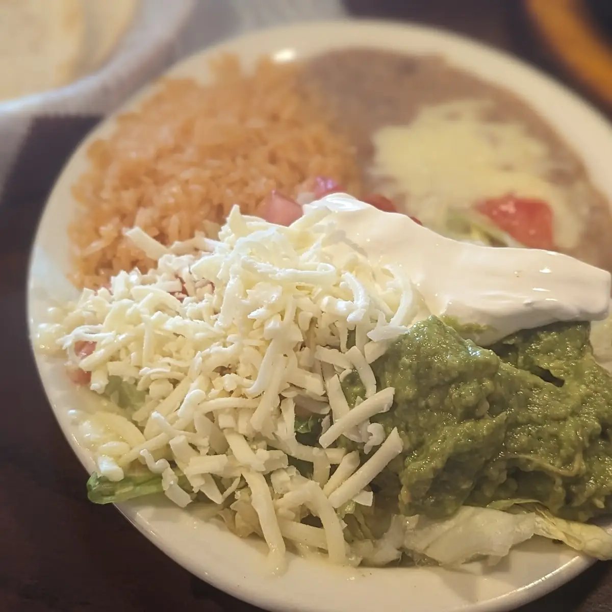 Kids One Enchilada Rice and Refried Beans