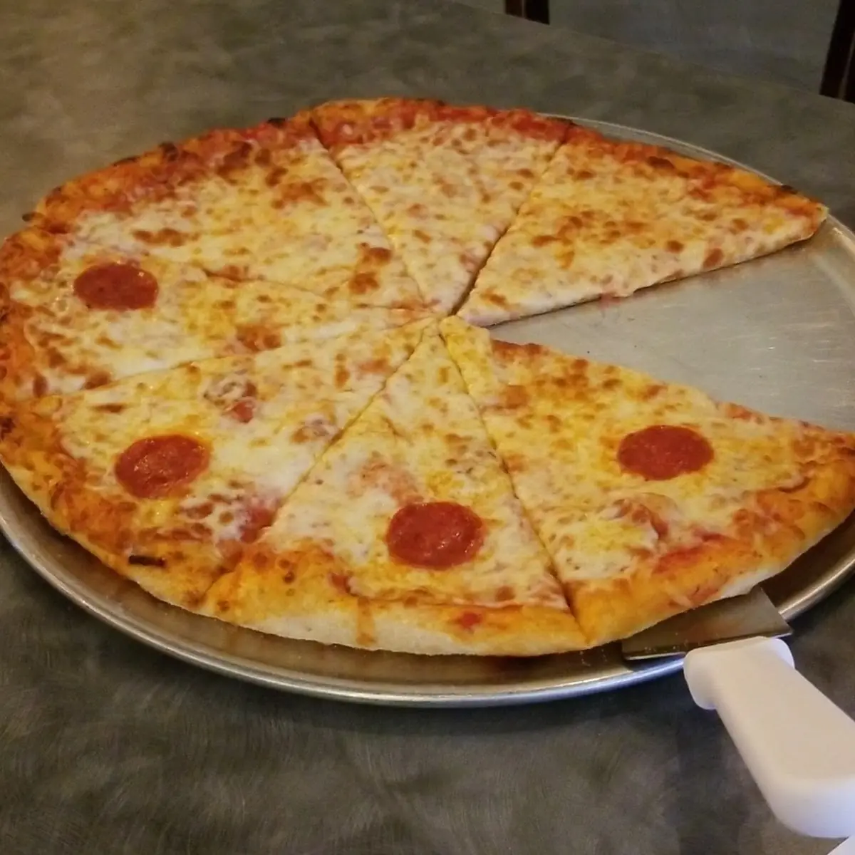 Half Pepperoni Half Plain Cheese Pizza