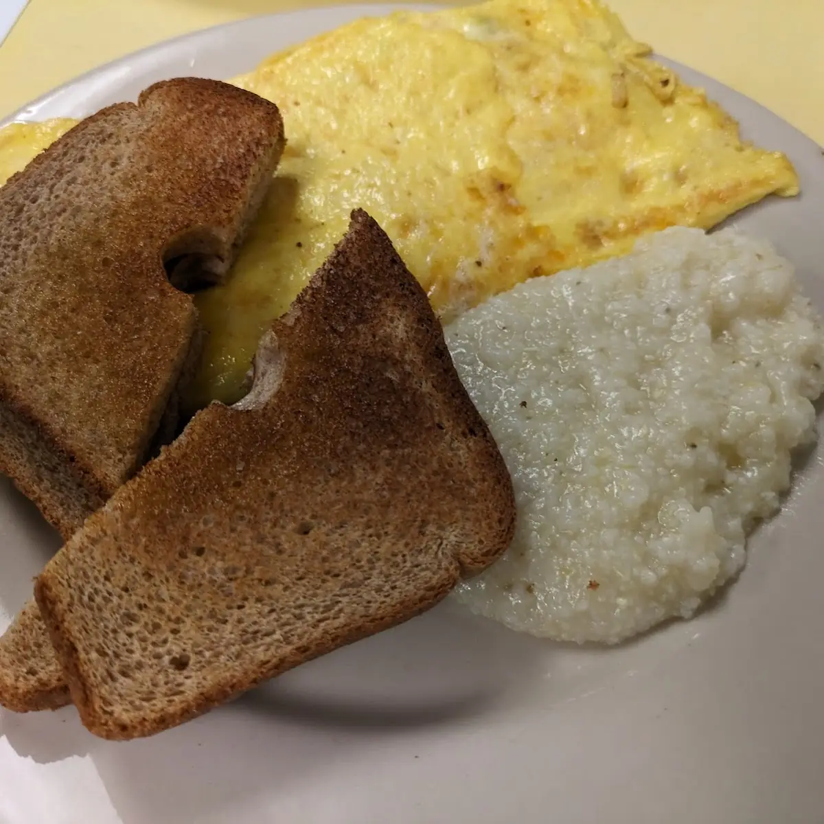 Veggie Omelette with Grits and Wheat Toast
