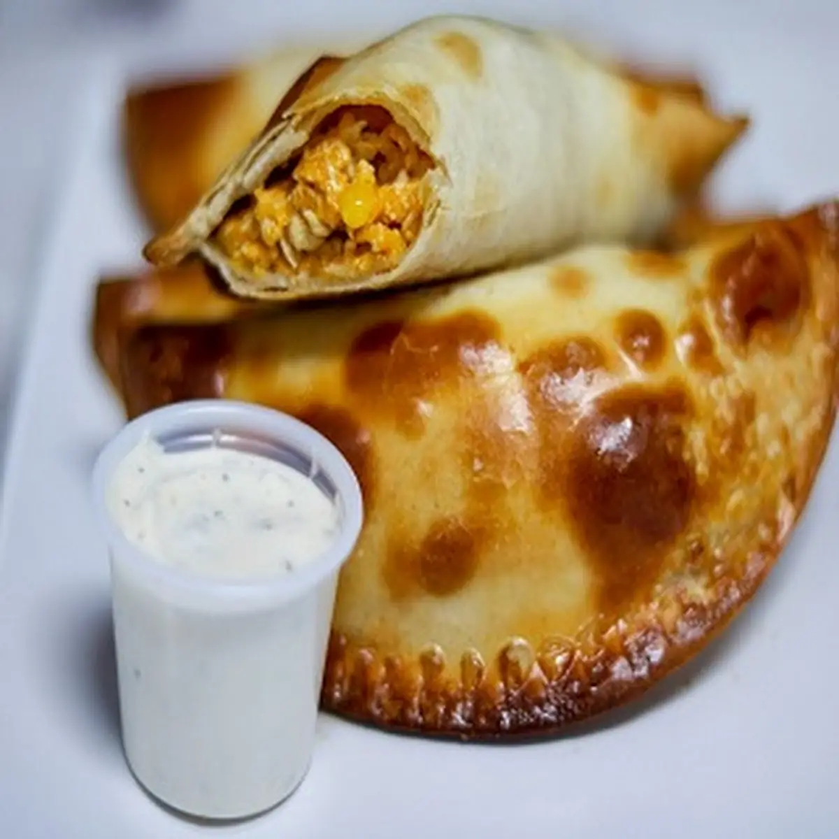 Buffalo Chicken Empanada w Garlic Ranch Sauce