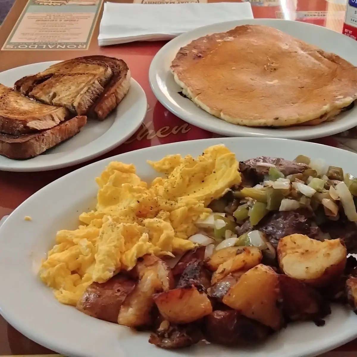 Steak Tips with Onions & Peppers Home Fries Scrambled Eggs Rye Toast Blueberry Pancake
