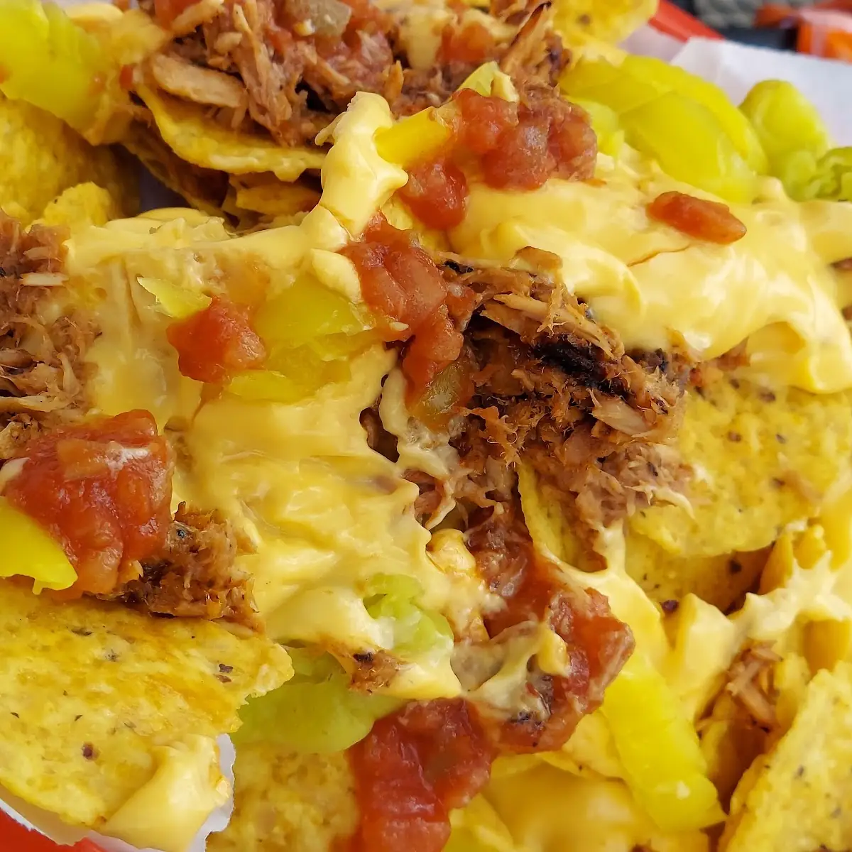 Nachos with Pulled Pork Normally Comes with Brisket