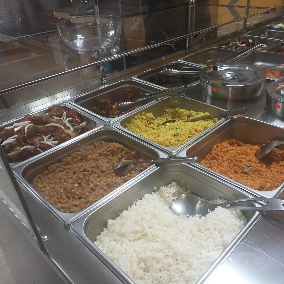 White Rice Jollof Rice Fried Rice Beans and Fish