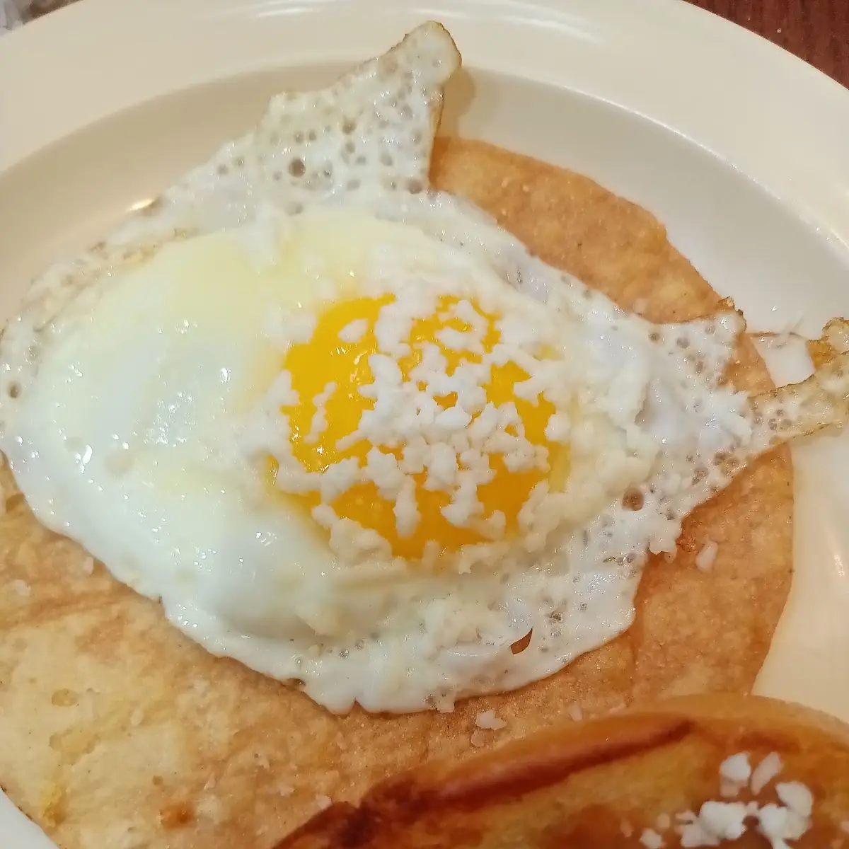 Over Easy Egg on a Tostada