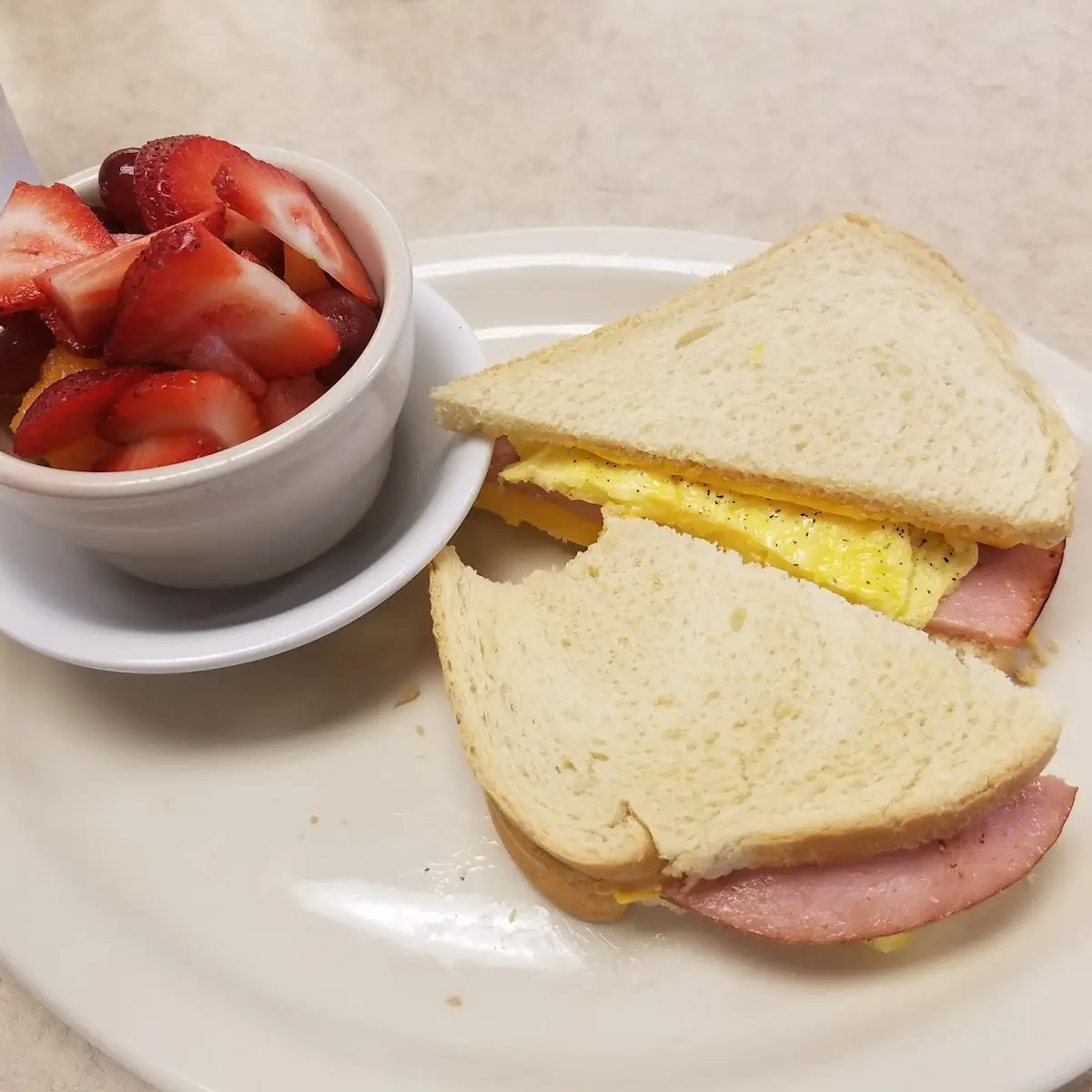 Breakfast Sandwich with Fruit Bowl