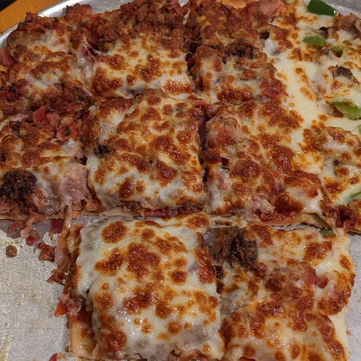 Half Mario Special Half Meat Lovers Pizza
