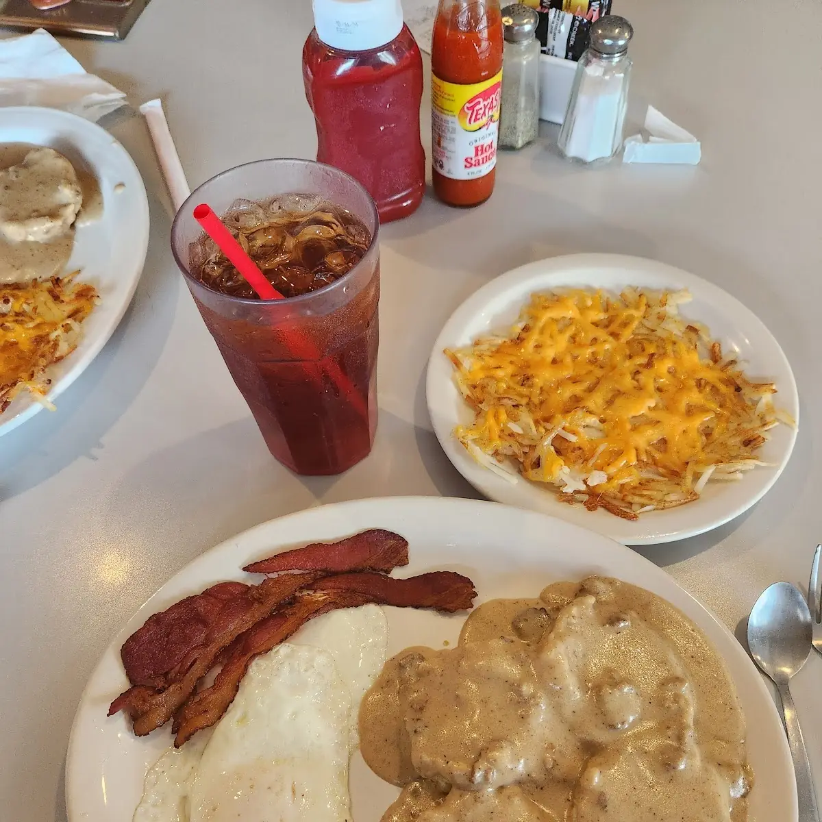 Biscuits and Gravy Bacon & Eggs and Hash Brows with Cheese