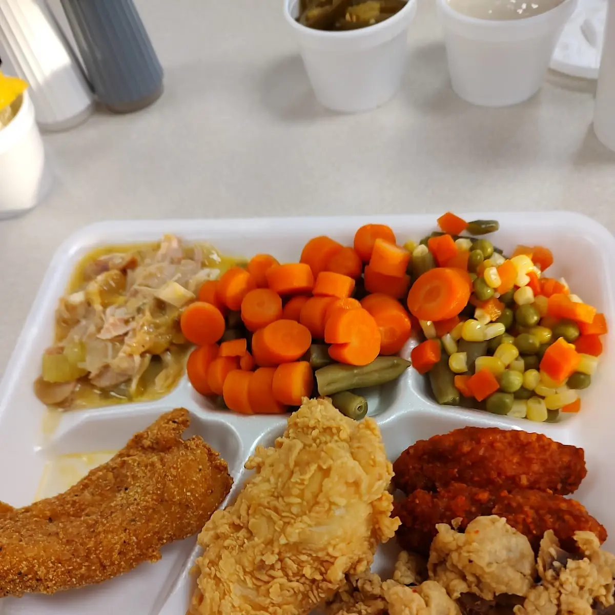 Fish Buffalo Wings Gizzards Chicken Tenders and Vegetables