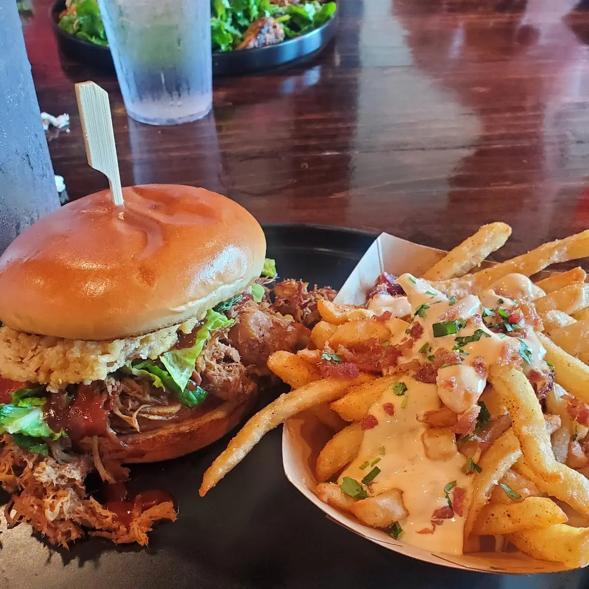 Sloth Pulled Pork Sandwich and Kimchi Fries