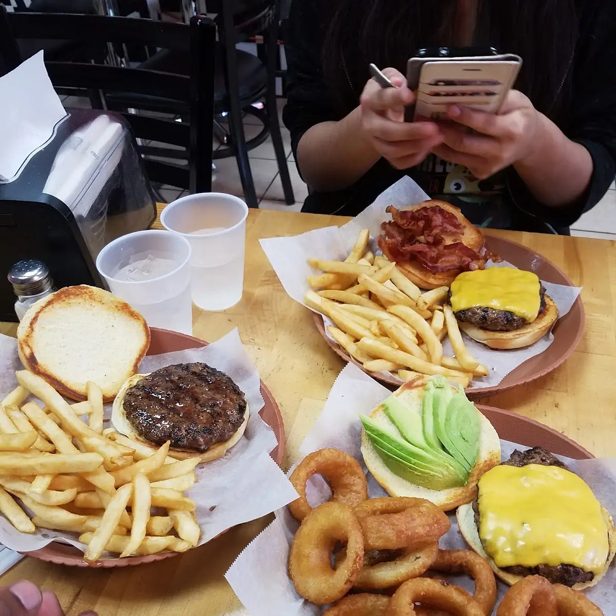 6oz Cheeseburger with Avocado Slices and Onion Rings