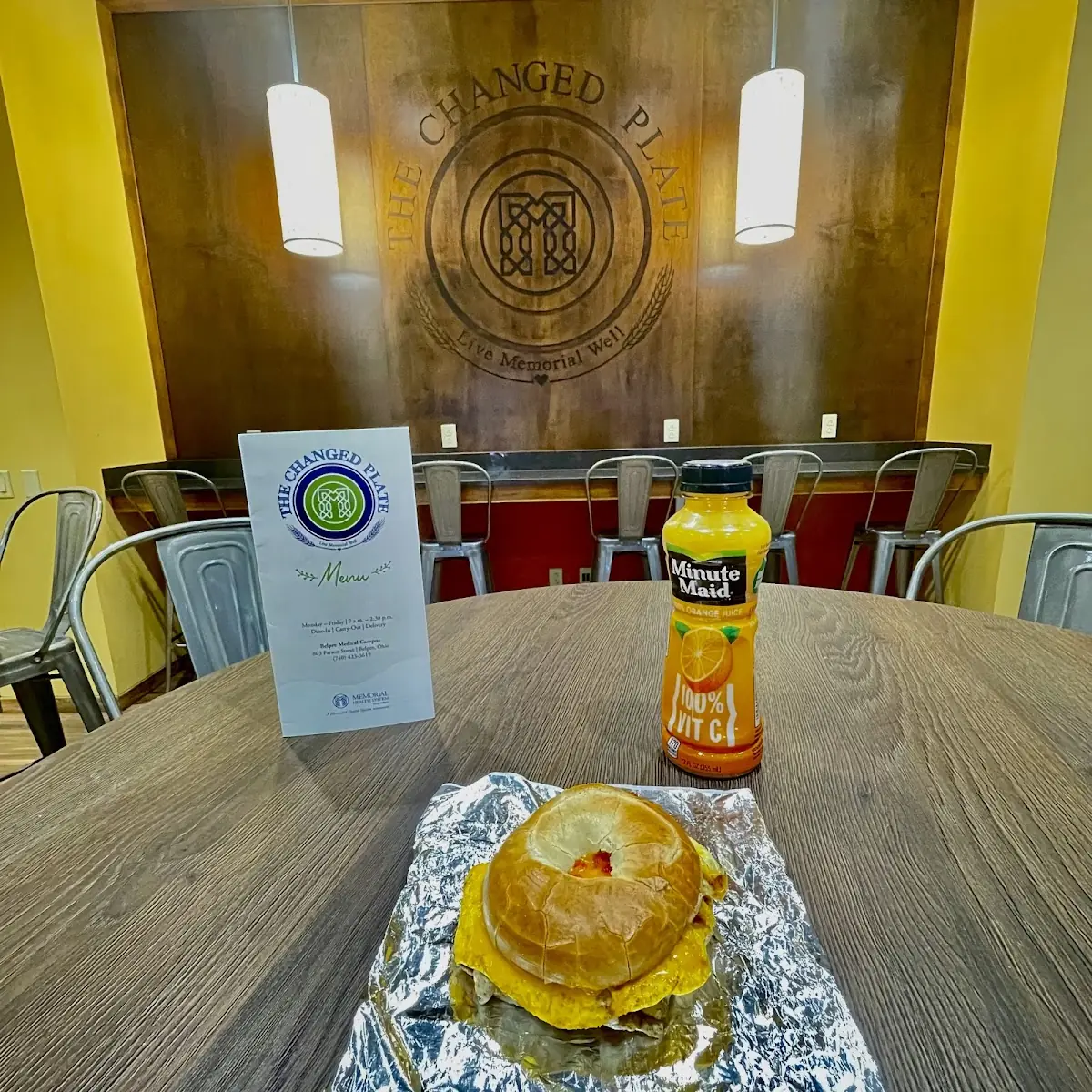Sriracha Egg on Cheese Bagel with Orange Juice