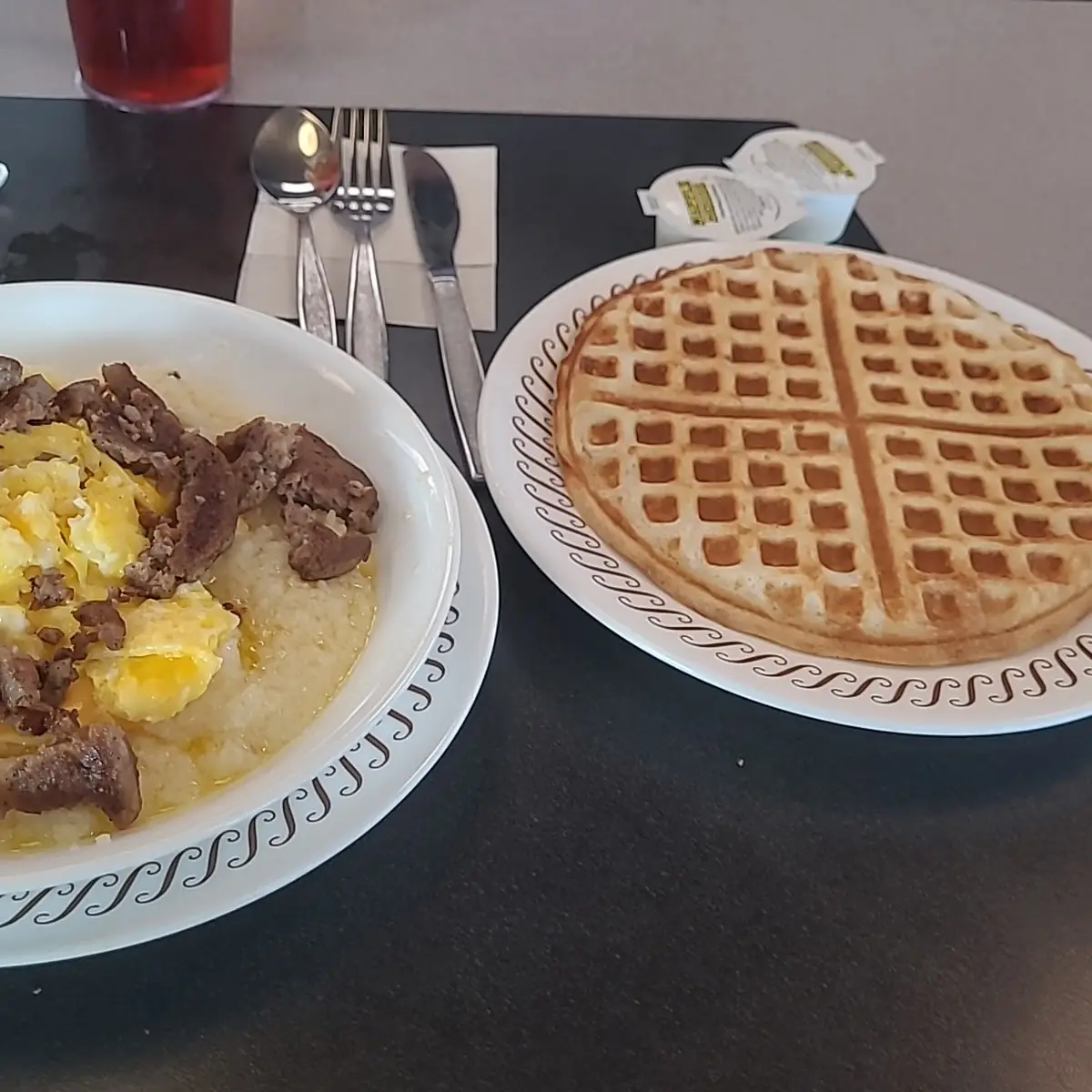 Sausage Egg & Cheese Grits Bowl with a Waffle