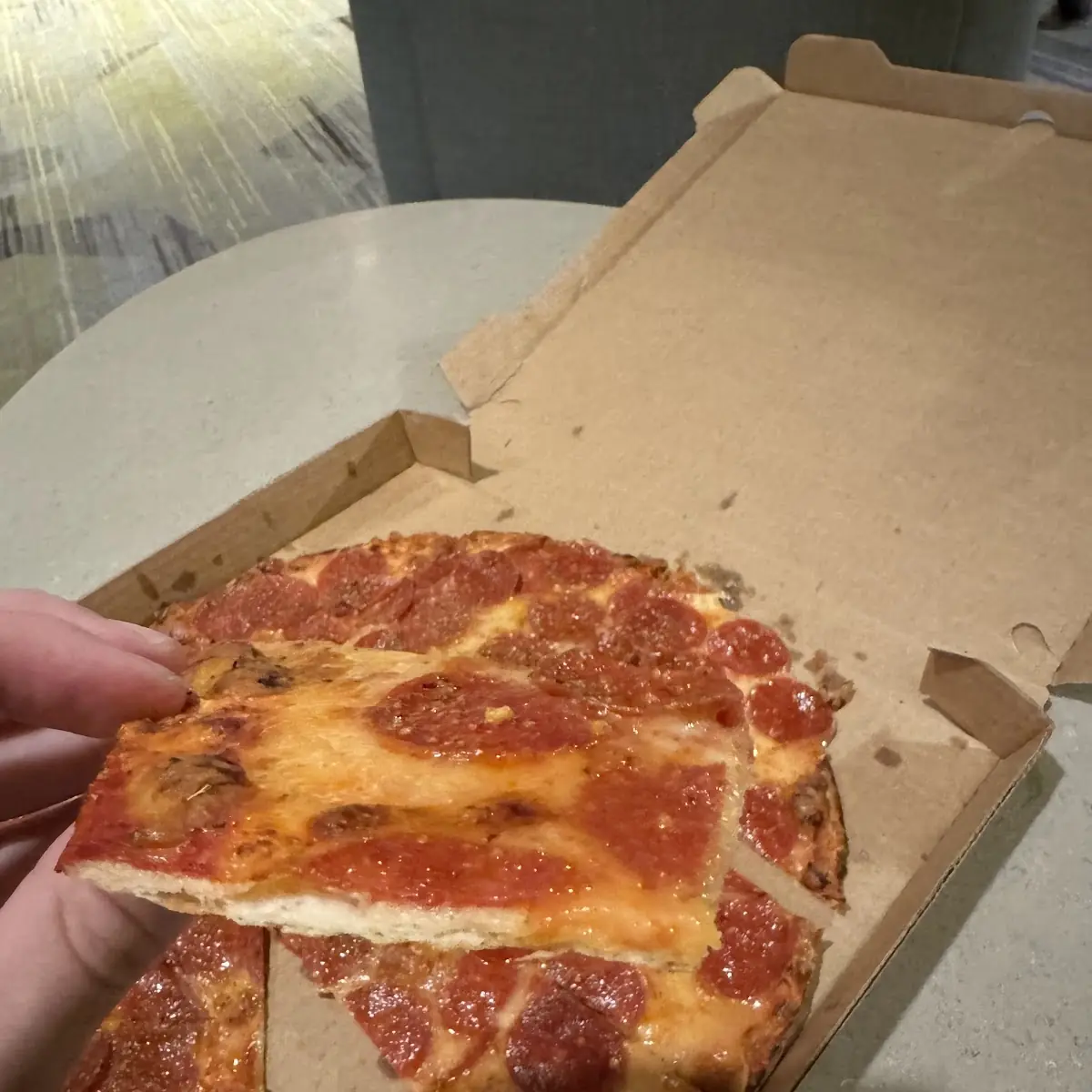 Thing Crust Double Pepperoni Pizza Slice