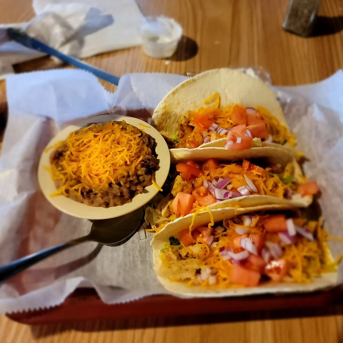 3 Beef Tacos with Soft Shell Lettuce Tomato Rice and Beans