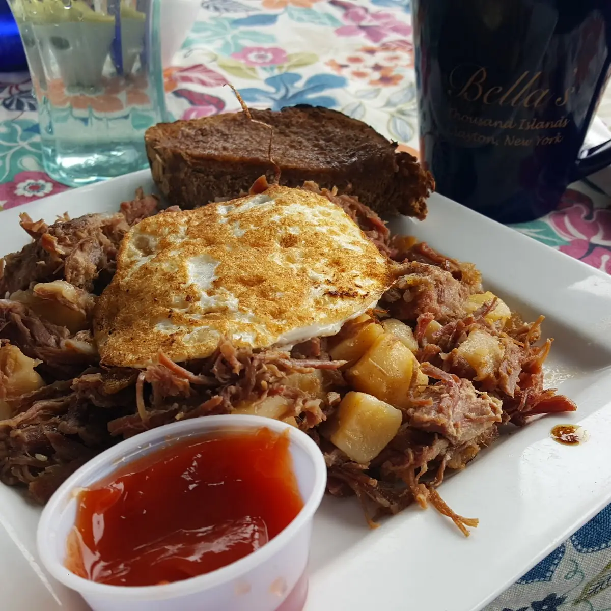 Half Order Fried Egg over Homemade Corned Beef Hash with Potatoes