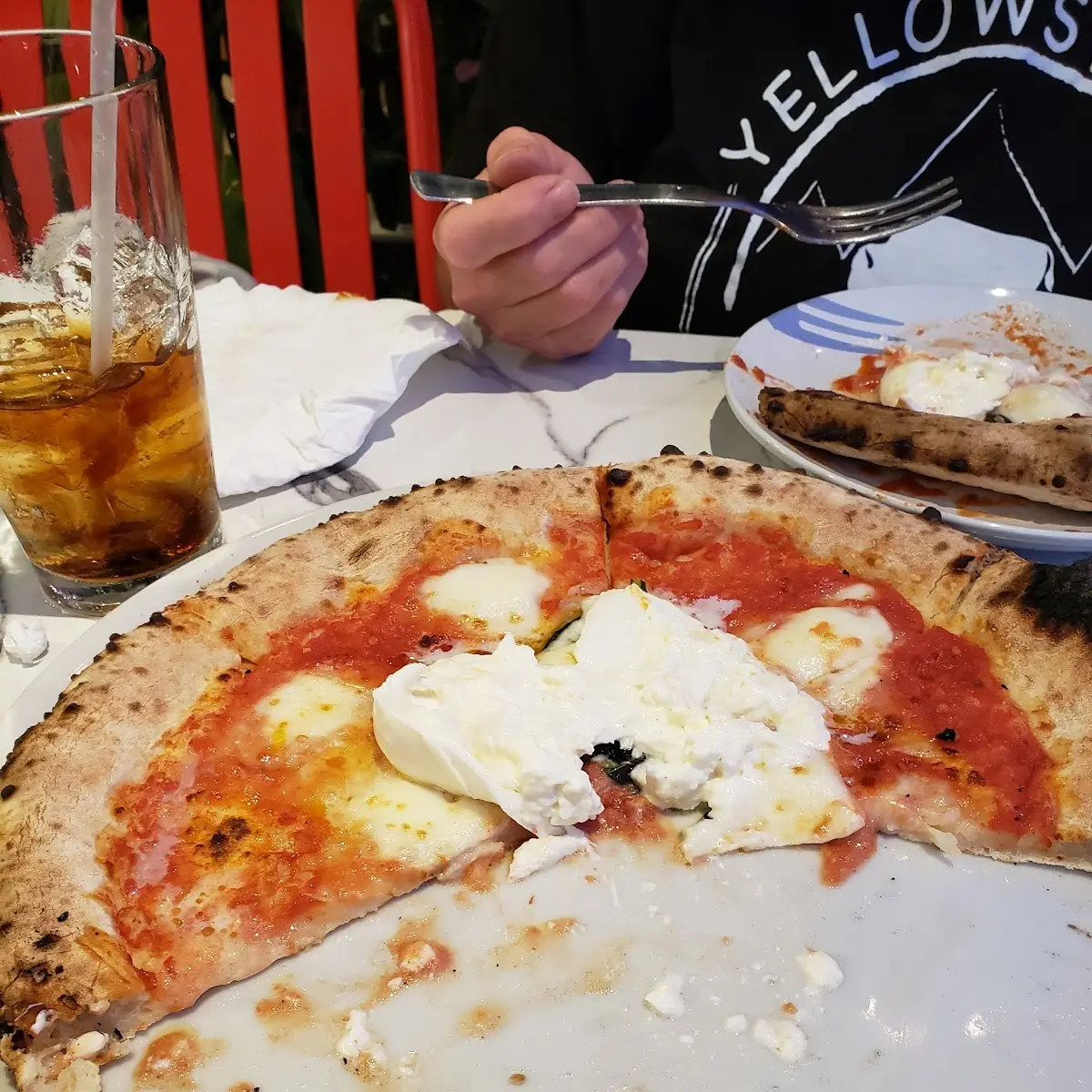 It's a Margherita Pizza with a Mozzarella Ball
