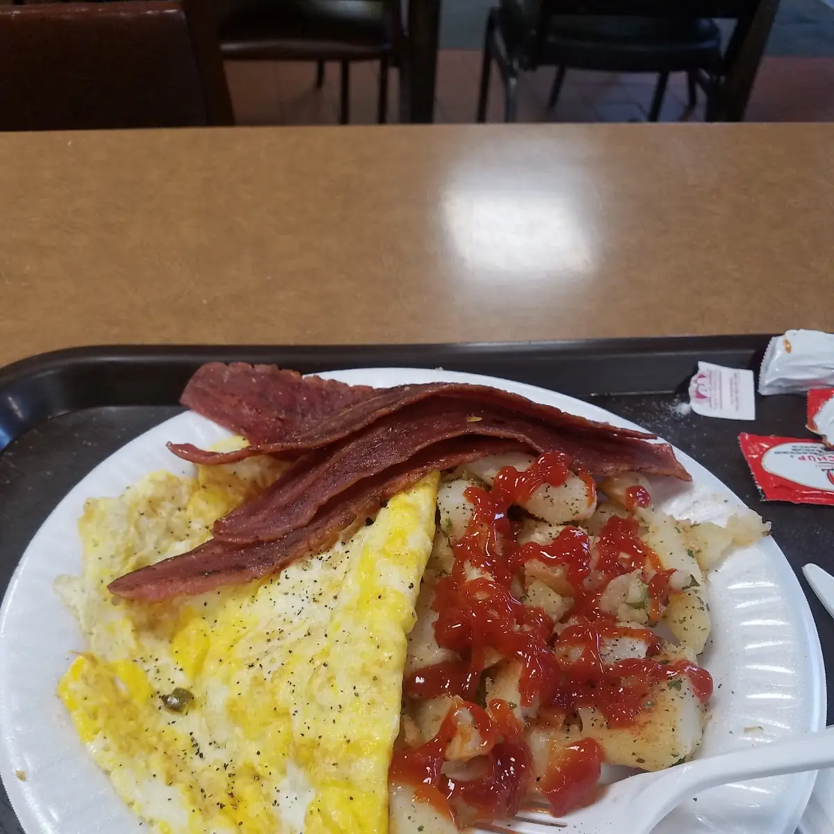 Turkey Bacon Scrambled Eggs and Home Fries with Ketchup