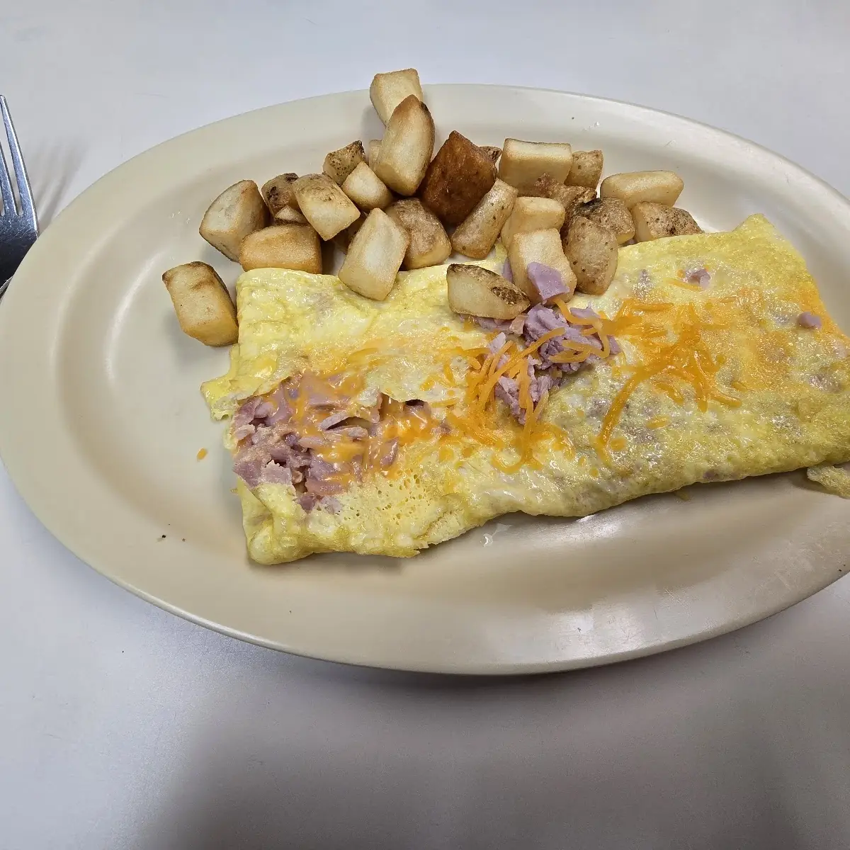 Corned Beef Hash and Cheddar Omelet