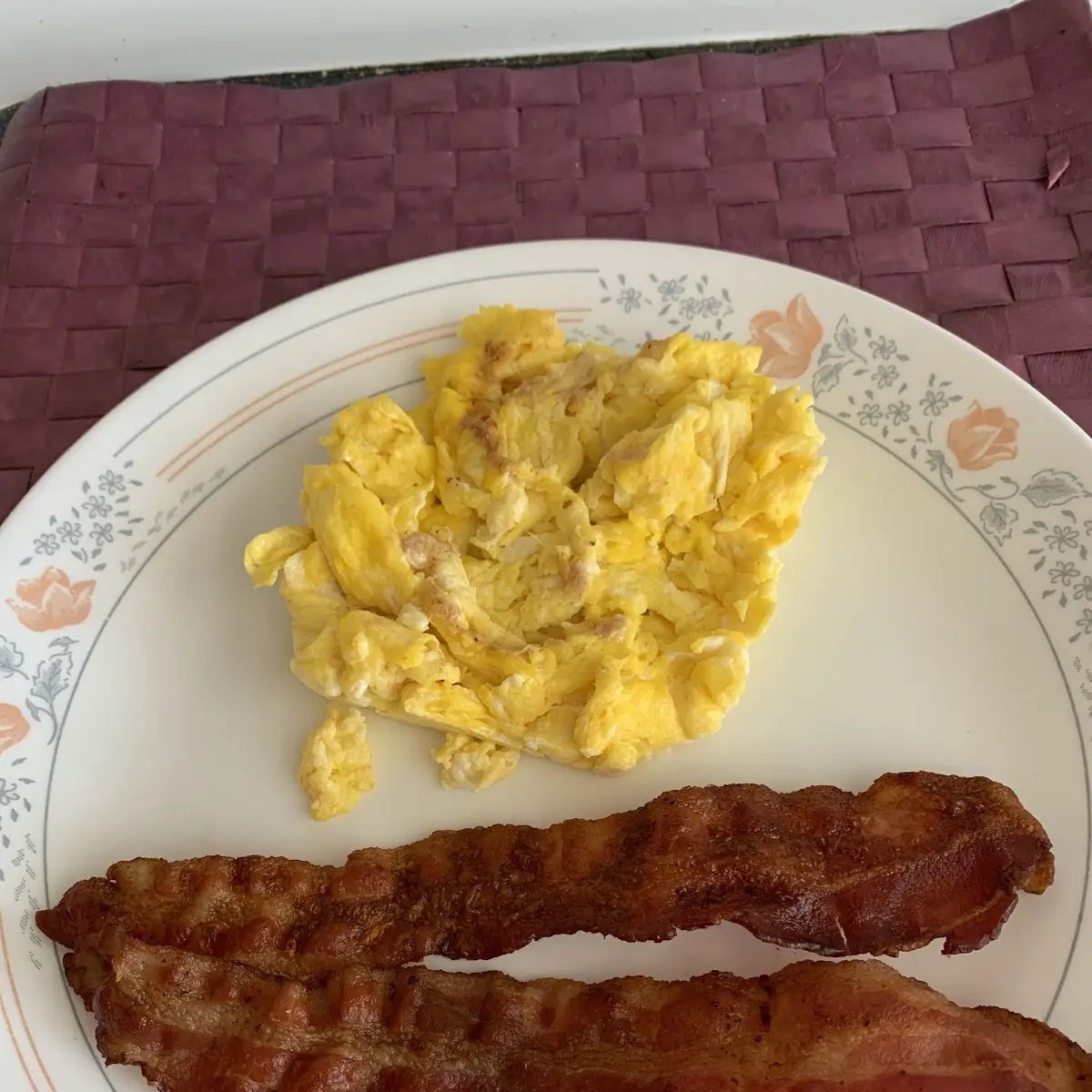 Scrambled Eggs and 2 Bacon Strips